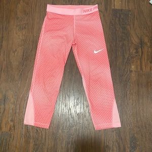 pink nike pros just bellow the knee